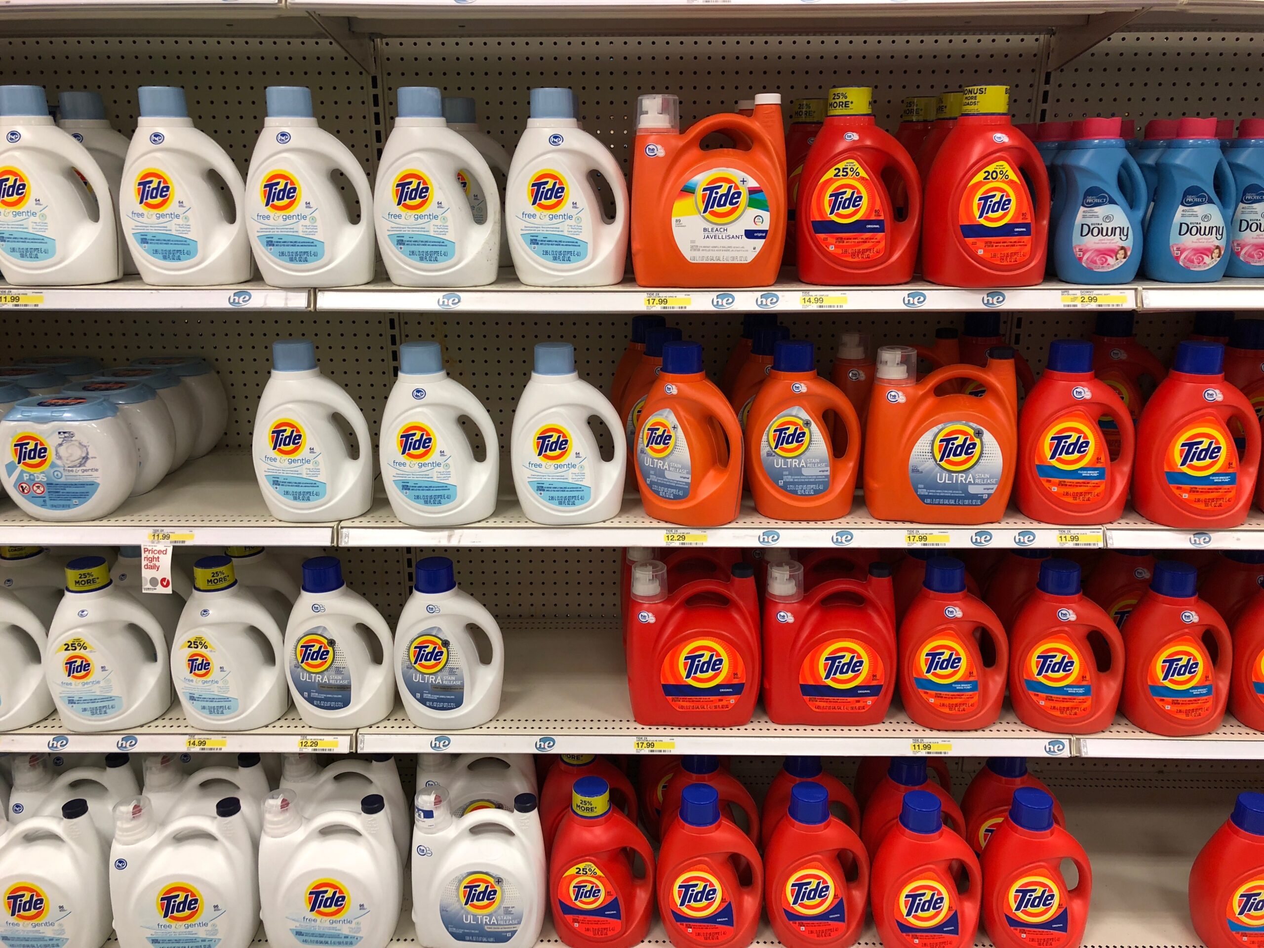 Photograph of laundry detergent on a shelf- indicative of savings.