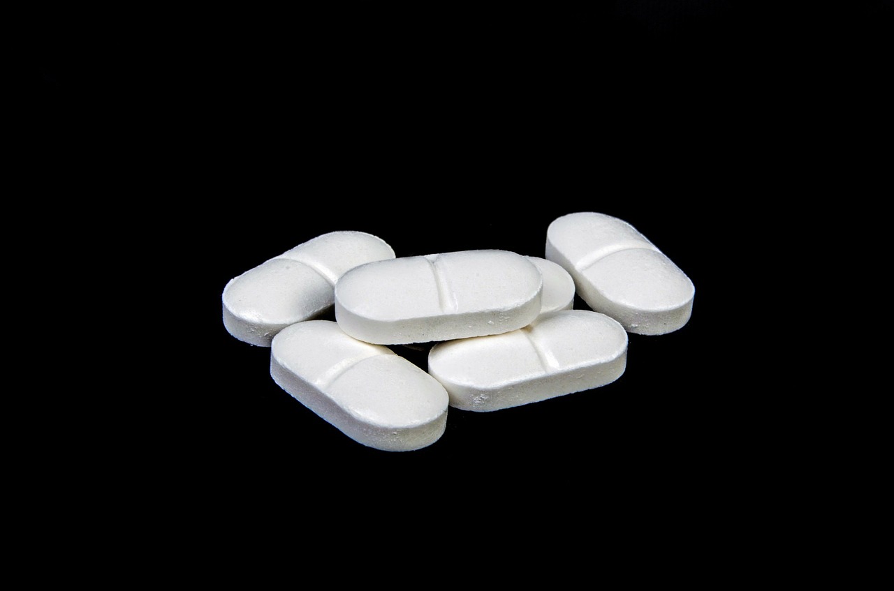 can low dose aspirin cause bleeding gums