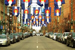 Colorado flags over Denver street.